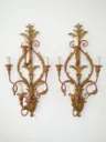 Coppia di appliques in ferro e legno dorato