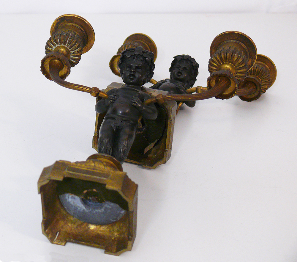 [CA1134] Coppia di candelabri con putti