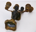Coppia di candelabri con putti