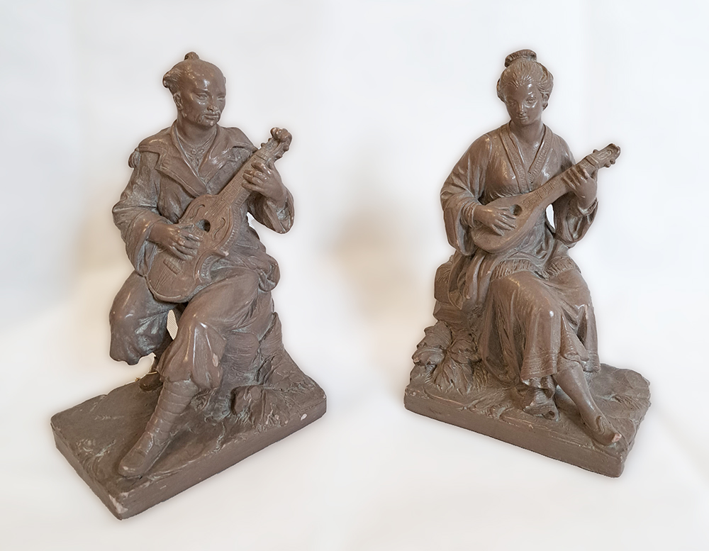 Coppia di sculture in terracotta dipinta "cinesi"