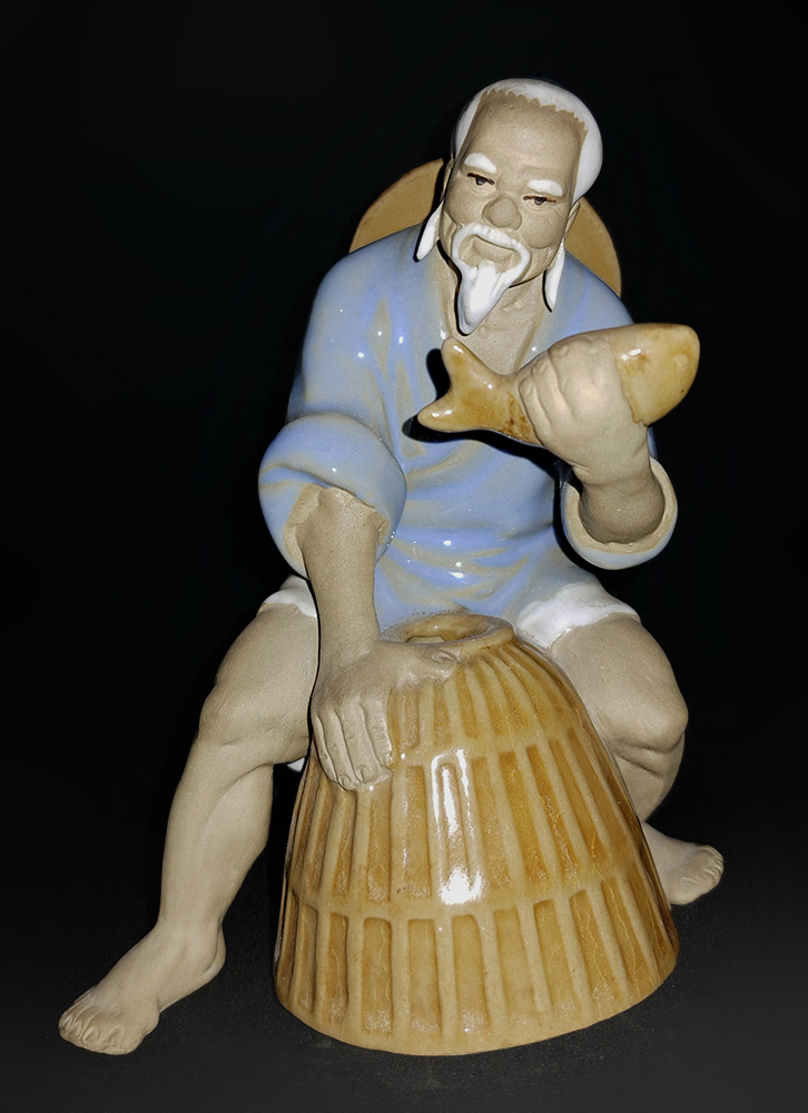 Venditore di pesce in maiolica Sancai