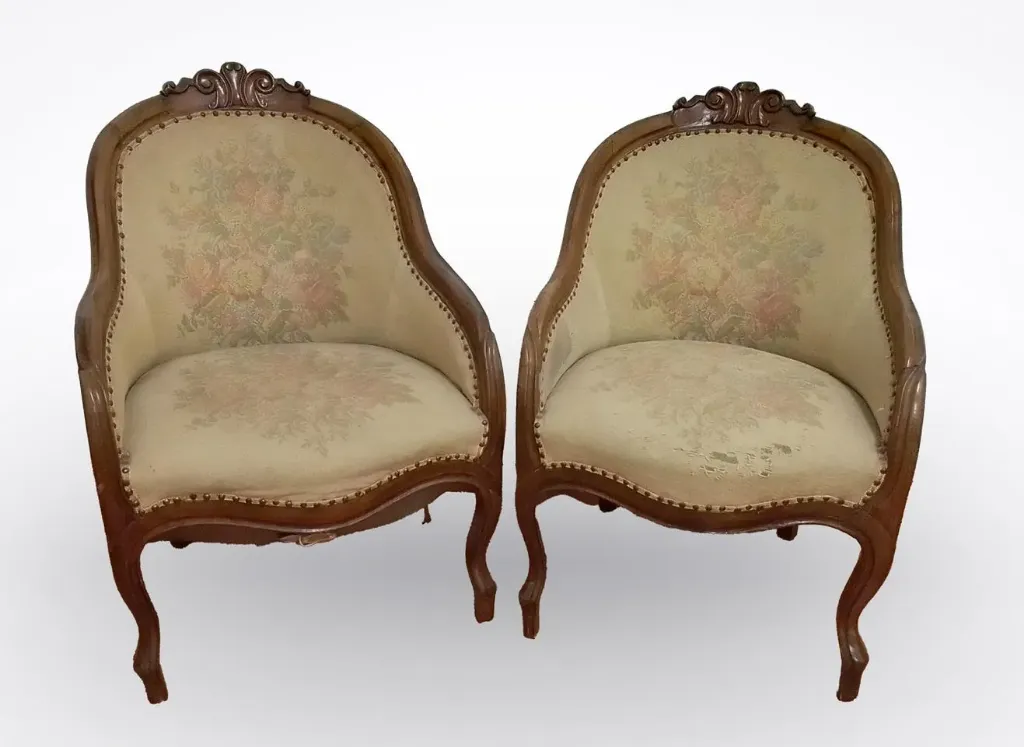 Coppia di poltroncine a pozzetto