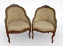 Coppia di poltroncine a pozzetto
