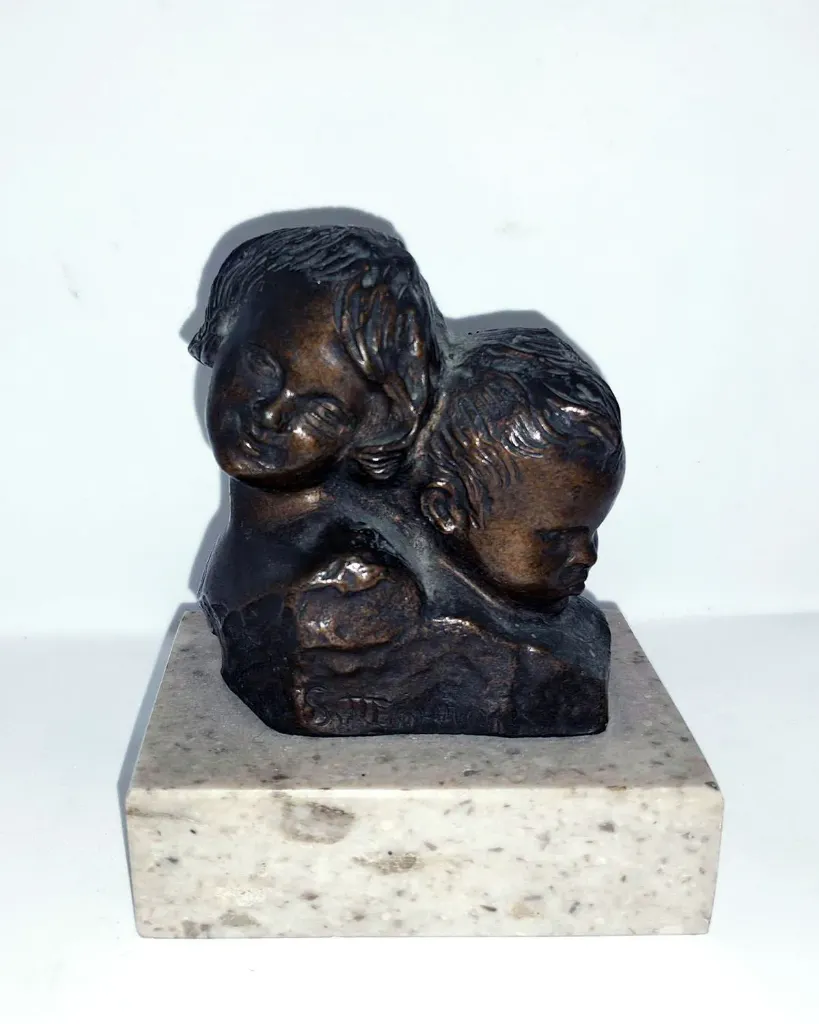 [CA/1563] Bronzetto di due testine di scugnizzi f.to